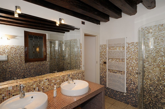 Imagen de la habitación del B&B Riva De Biasio. Foto 10