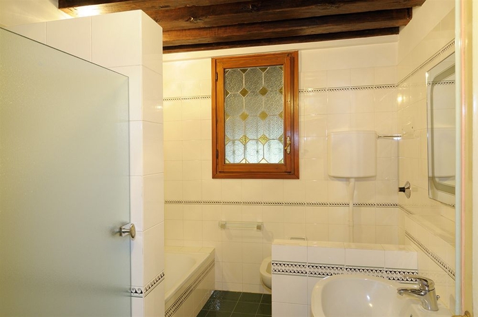 Imagen de la habitación del B&B Riva De Biasio. Foto 11