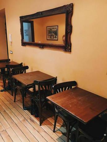 Imagen del bar/restaurante del B&B Roman Rooms. Foto 3