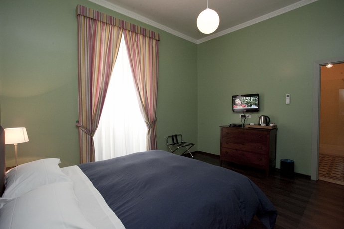 Imagen de los interiores del B&B Santi Quattro Al Colosseo. Foto 13