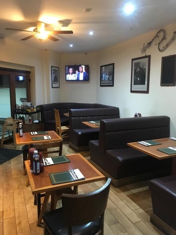 Imagen del bar/restaurante del B&B Shanahans BandB with Sports Bar. Foto 2