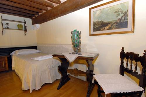 Imagen de la habitación del B&B Siena In Centro. Foto 7