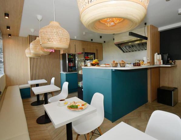 Imagen del bar/restaurante del B&B Sleepinn Gdansk Airport. Foto 12