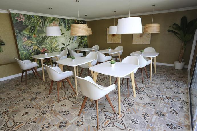 Imagen del bar/restaurante del B&B The Vintage Club. Foto 10