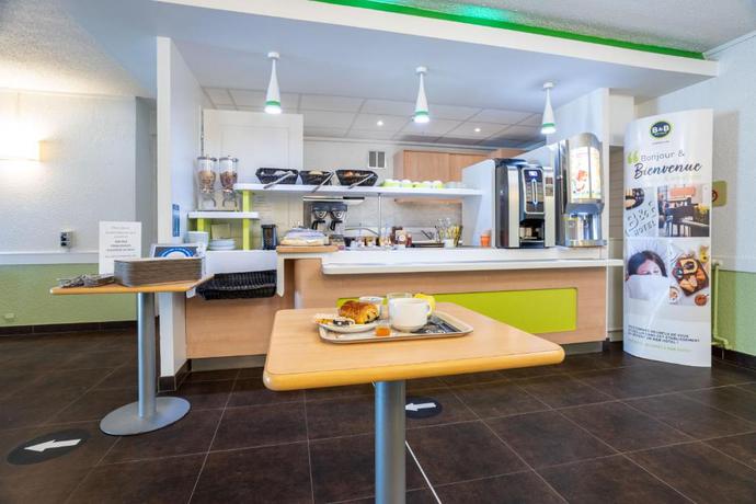 Imagen del bar/restaurante del B&B Valenciennes Sud. Foto 2