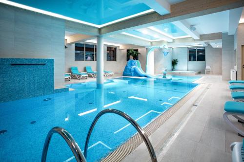 Imagen de la piscina del B&B Villa Cannes Resort Zakopane - grota solna, sauna fińska. Foto 14