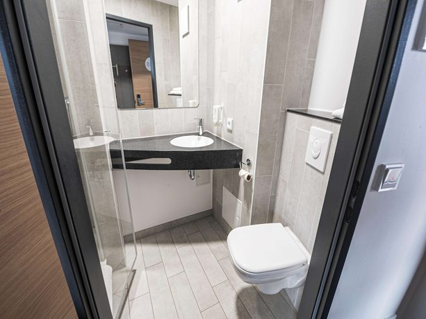 Imagen de la habitación del B&B Wiener-Neudorf. Foto 11