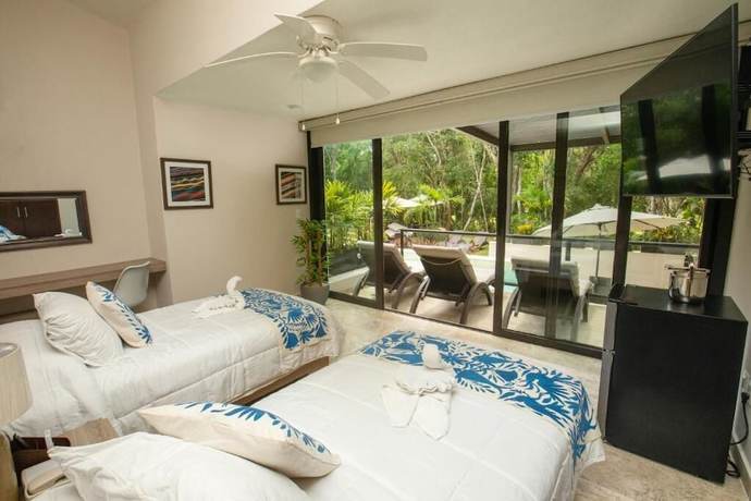 Imagen de la habitación del B&B Xaha Villas Suites and Golf Resort. Foto 9