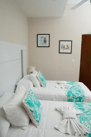 Imagen de la habitación del B&B Xaha Villas Suites and Golf Resort. Foto 10