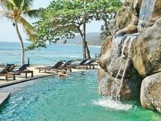 Imagen de la piscina del Boutique Alang Alang Boutique Beach Resort. Foto 9