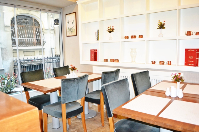 Imagen del bar/restaurante del Boutique Alyon Suite Hotel. Foto 4