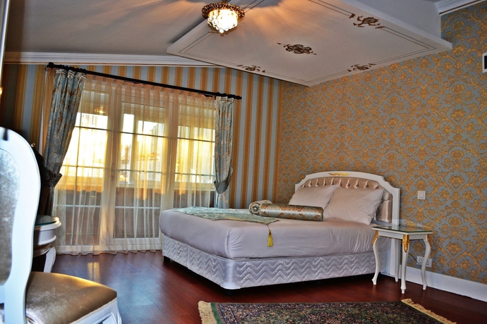 Imagen de la habitación del Boutique Alyon Suite Hotel. Foto 11