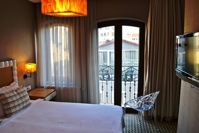 Imagen de la habitación del Boutique Alyon Suite Hotel. Foto 12