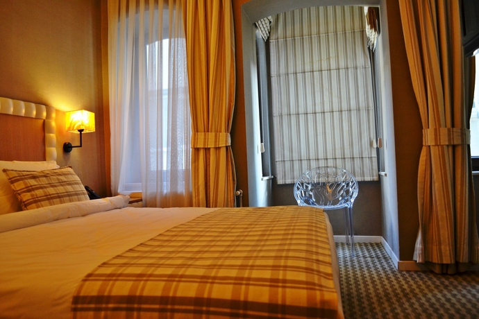 Imagen de la habitación del Boutique Alyon Suite Hotel. Foto 14