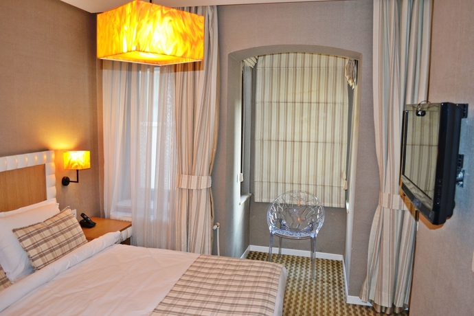Imagen de la habitación del Boutique Alyon Suite Hotel. Foto 15