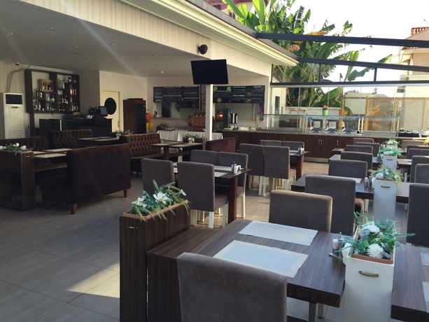 Imagen del bar/restaurante del Boutique Blueberry Hotel - Class. Foto 4
