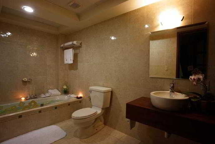 Imagen de la habitación del Boutique Casa De Las Flores Hotel. Foto 6