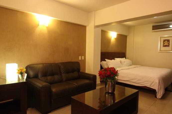 Imagen de la habitación del Boutique Casa De Las Flores Hotel. Foto 7