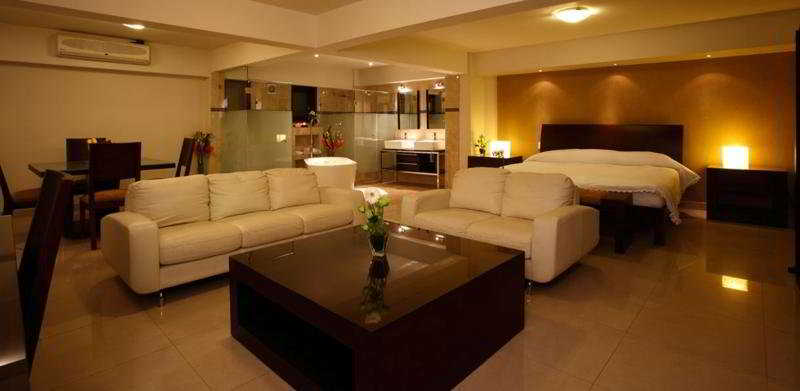 Imagen de la habitación del Boutique Casa De Las Flores Hotel. Foto 9