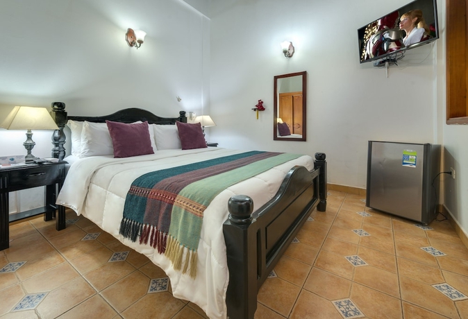 Imagen de la habitación del Boutique Casa Del Curato. Foto 9