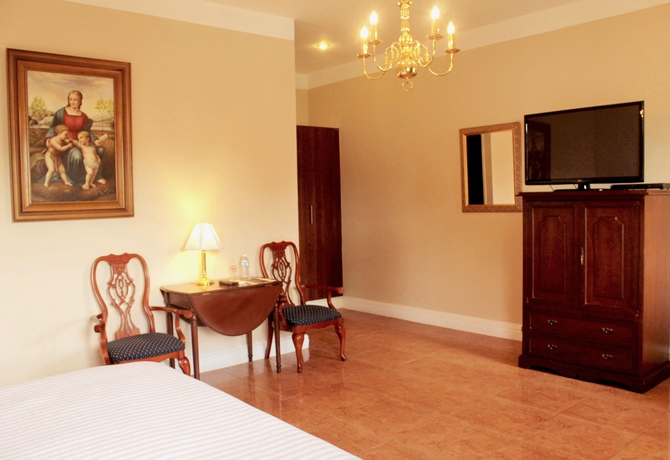 Imagen de la habitación del Boutique Casa Lucia Hotel. Foto 6