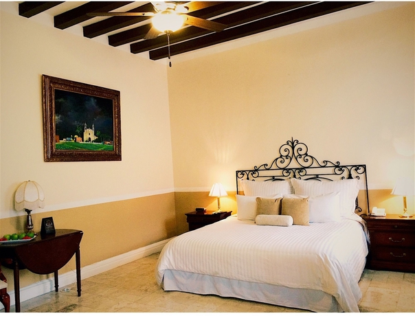 Imagen de la habitación del Boutique Casa Lucia Hotel. Foto 7