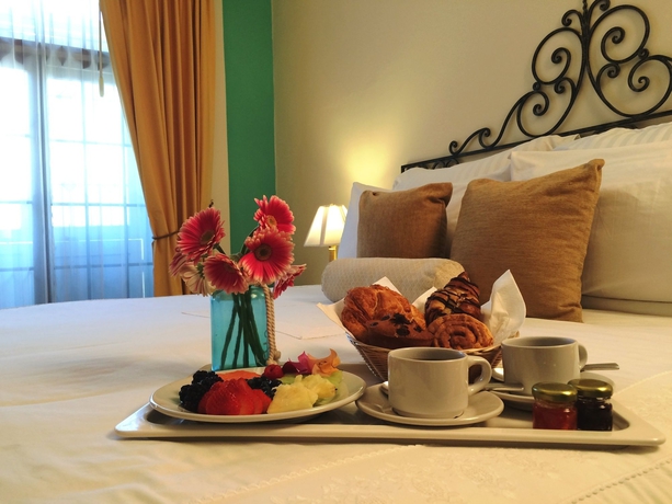 Imagen de la habitación del Boutique Casa Lucia Hotel. Foto 8