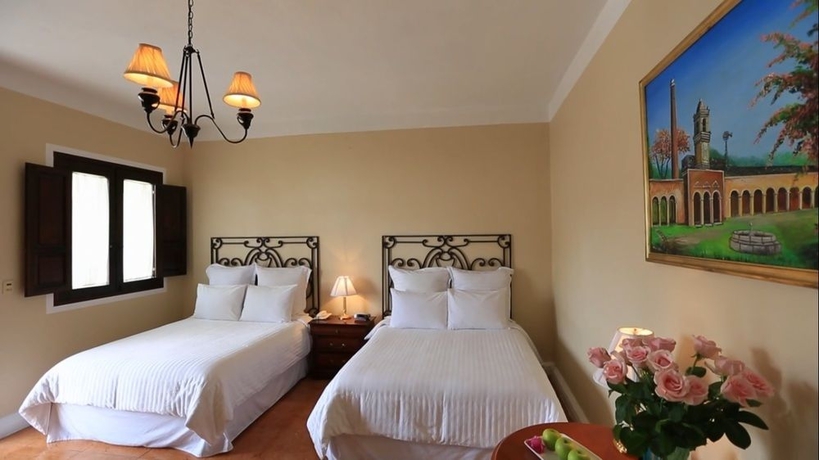 Imagen de la habitación del Boutique Casa Lucia Hotel. Foto 9