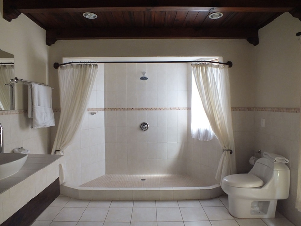 Imagen de la habitación del Boutique Casa Santa Rosa Hotel. Foto 3