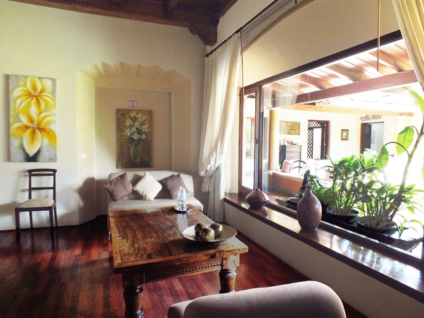 Imagen de la habitación del Boutique Casa Santa Rosa Hotel. Foto 15