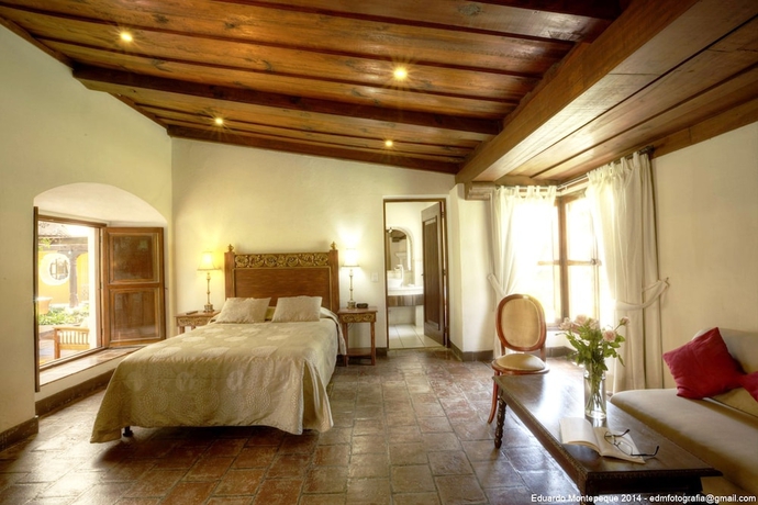 Imagen de la habitación del Boutique Casa Santa Rosa Hotel. Foto 16