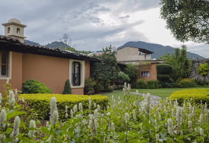 Imagen de la habitación del Boutique Casa Santa Rosa Hotel. Foto 17