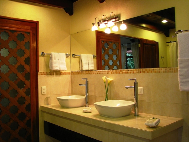 Imagen de la habitación del Boutique Casa Santa Rosa Hotel. Foto 18