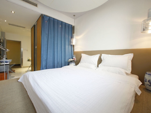 Imagen de la habitación del Boutique China Community Art Habitat Hotel. Foto 2