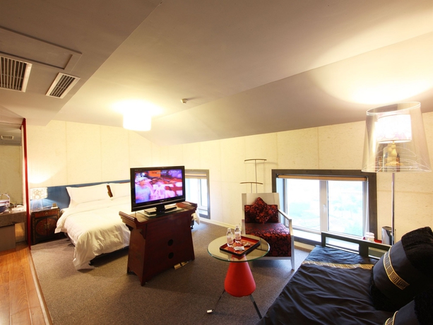 Imagen de la habitación del Boutique China Community Art Habitat Hotel. Foto 3
