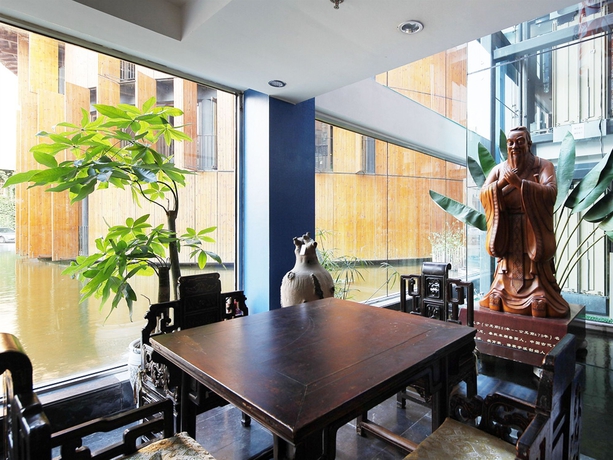 Imagen de los interiores del Boutique China Community Art Habitat Hotel. Foto 16