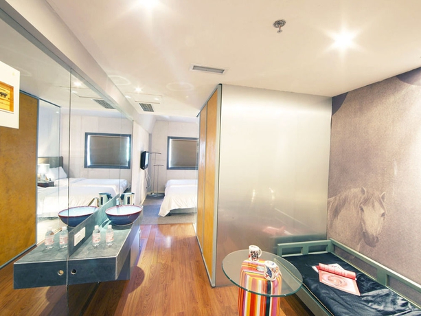 Imagen de la habitación del Boutique China Community Art Habitat Hotel. Foto 7