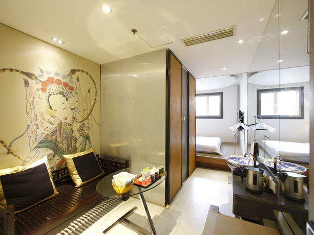 Imagen de la habitación del Boutique China Community Art Habitat Hotel. Foto 11
