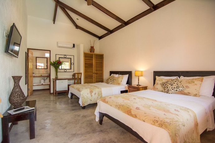 Imagen de la habitación del Boutique Conchal Hotel. Foto 8