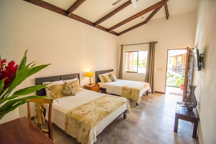 Imagen de la habitación del Boutique Conchal Hotel. Foto 9