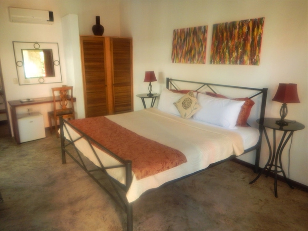 Imagen de la habitación del Boutique Conchal Hotel. Foto 15