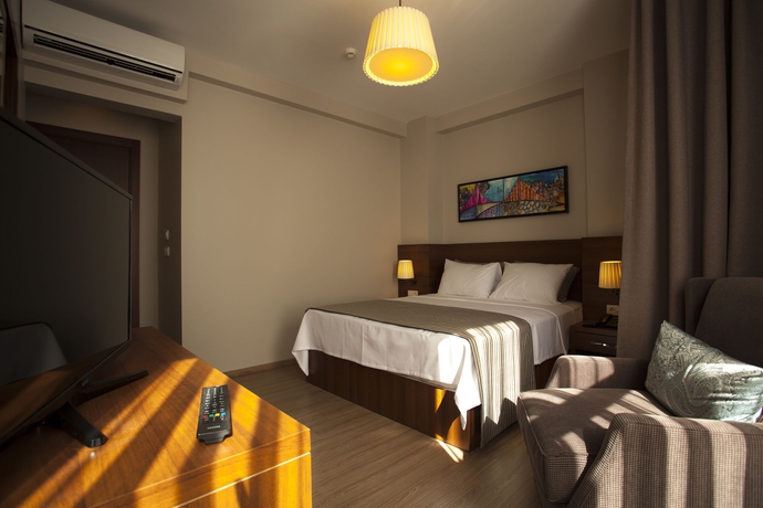 Imagen de la habitación del Boutique Cordis Hotel. Foto 15