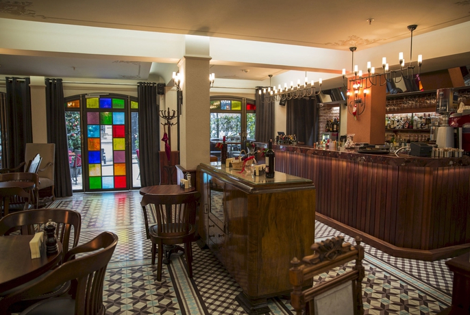 Imagen del bar/restaurante del Boutique Corinne Art and Hotel. Foto 3