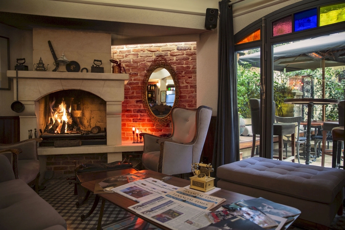 Imagen del bar/restaurante del Boutique Corinne Art and Hotel. Foto 4