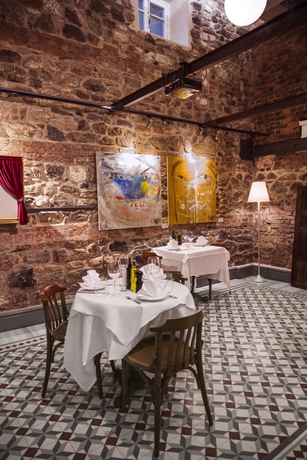 Imagen del bar/restaurante del Boutique Corinne Art and Hotel. Foto 5