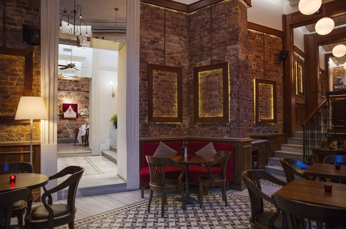 Imagen del bar/restaurante del Boutique Corinne Art and Hotel. Foto 6