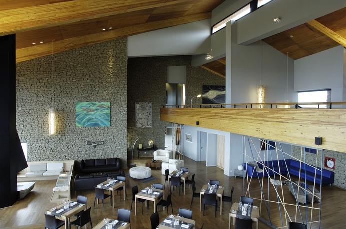 Imagen del bar/restaurante del Boutique Design Suites Calafate. Foto 2