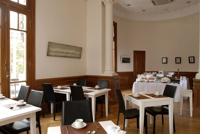 Imagen del bar/restaurante del Boutique Design Suites Salta. Foto 2