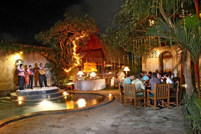Imagen del bar/restaurante del Boutique Dewani Villa Resort. Foto 5