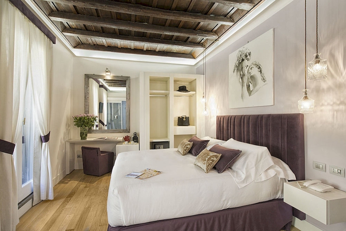 Imagen de la habitación del Boutique Domus Libera. Foto 15